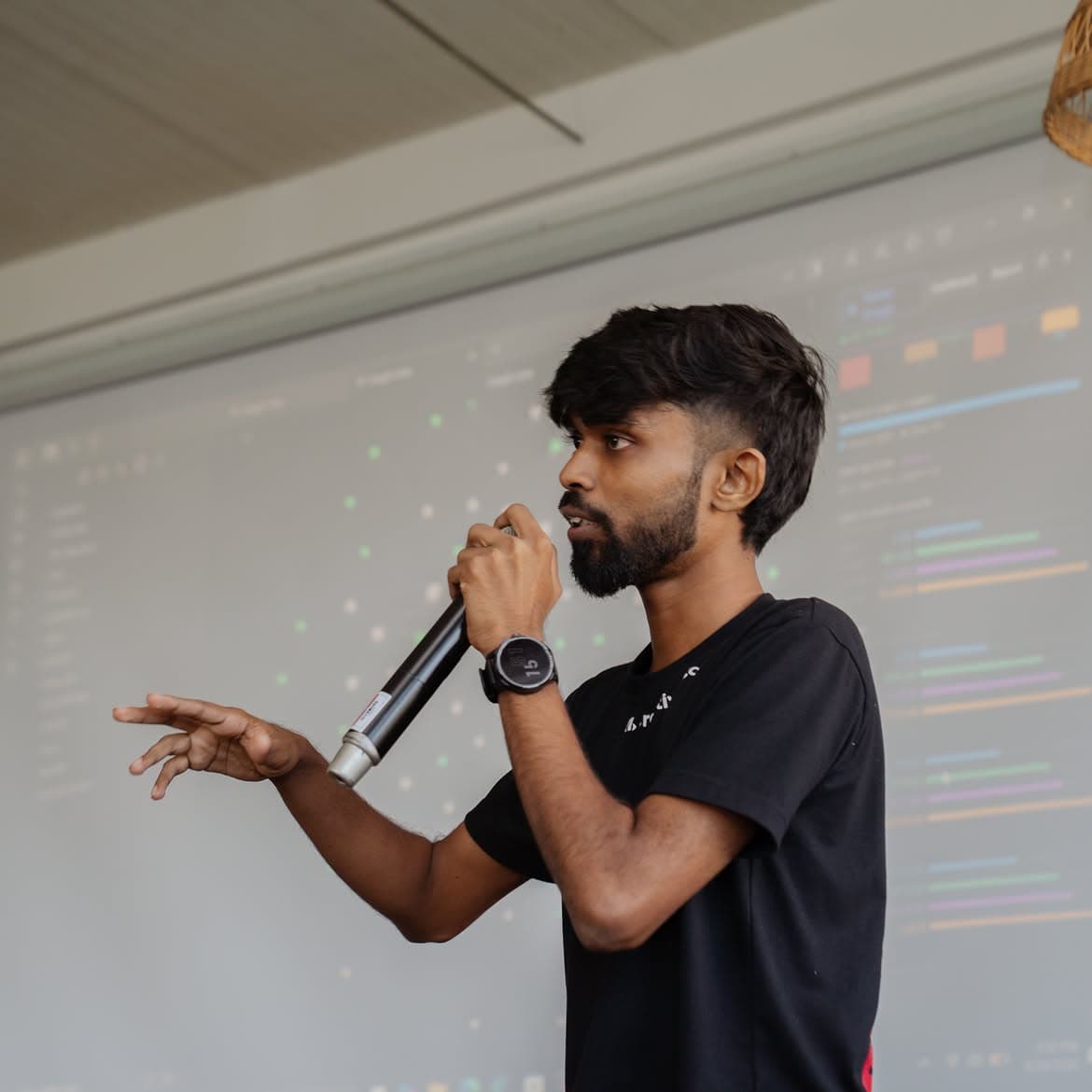 Viraj Samarasinghe speaking at a meetup